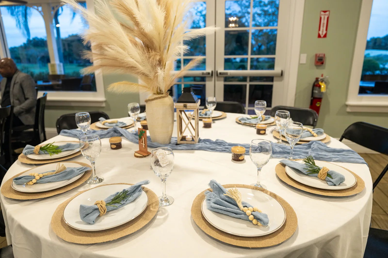 Refined place settings and table centerpiece