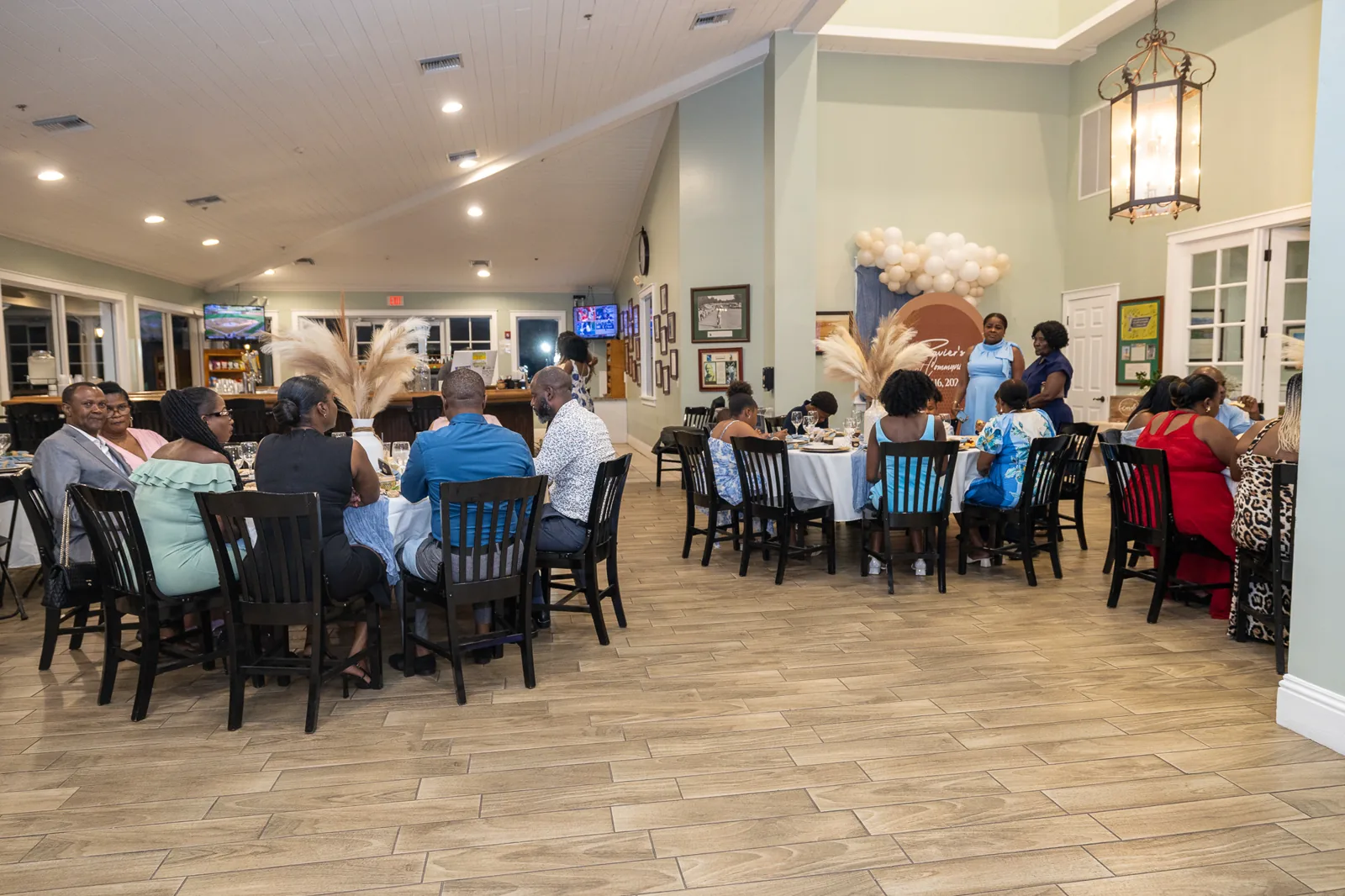 Wide view of guests enjoying a private event